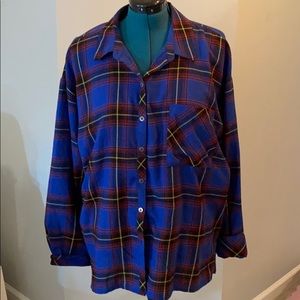 Blue plaid long sleeve button up shirt.